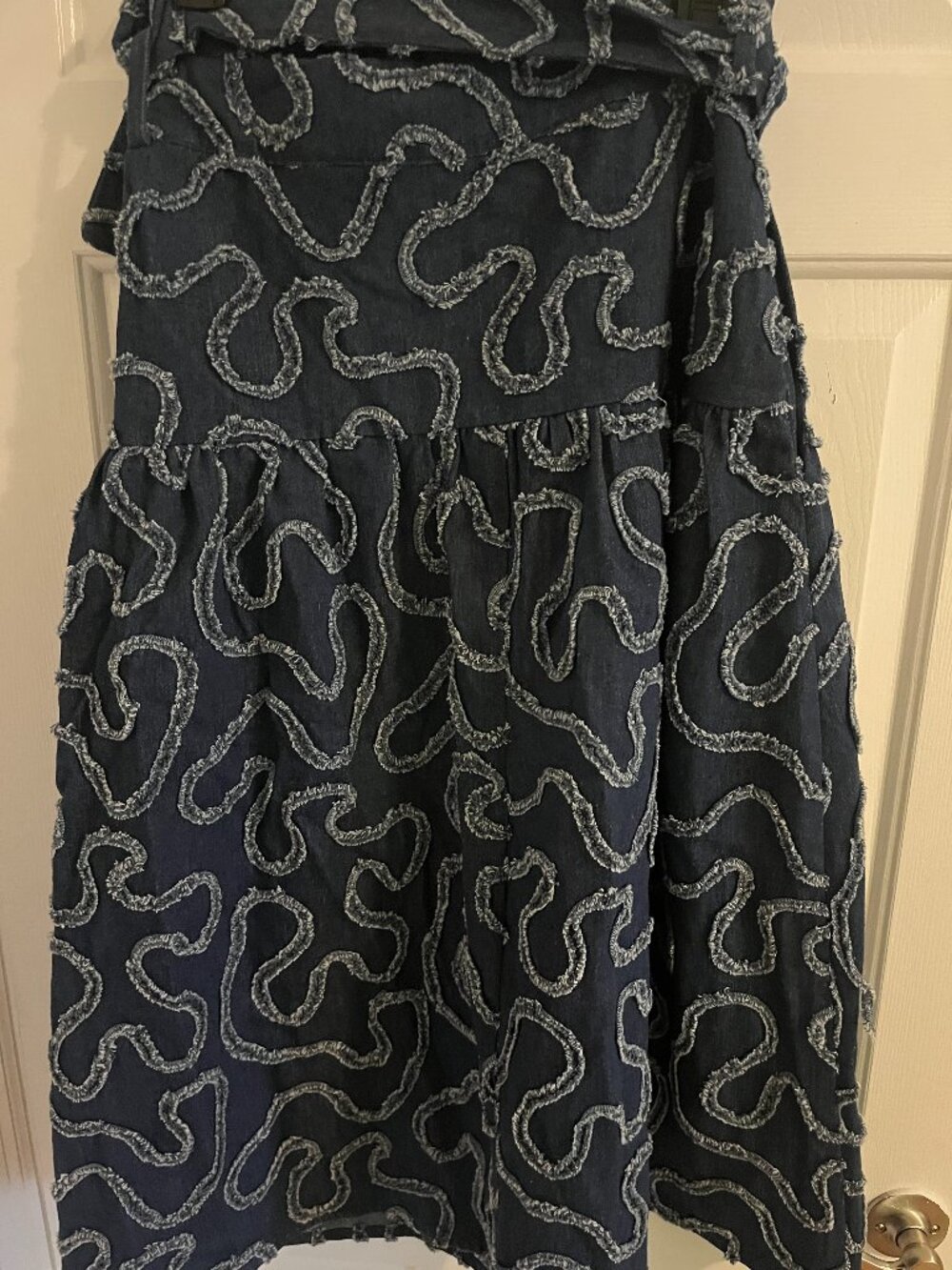Denim midi skirt with textured design and belt